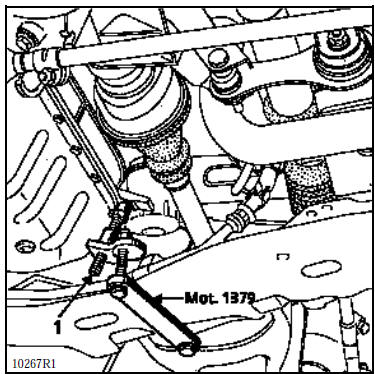 Fixer le Mot. 1040-01 sous le berceau en ayant préalablement fixé les cales Mot.